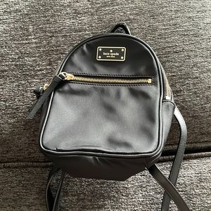 Black Kate spade mini back pack with adjustable straps